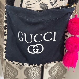 Black and Pink Crossbody Bag with Iconic Design
